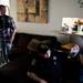 A police officer and members of the media record surveillance tape at a nearby neighbor's house on Sunday, July 7. Daniel Brenner I AnnArbor.com